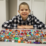 boy with beads4bravery strands