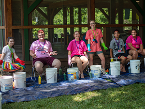 photo of LITs tie-dying at camp